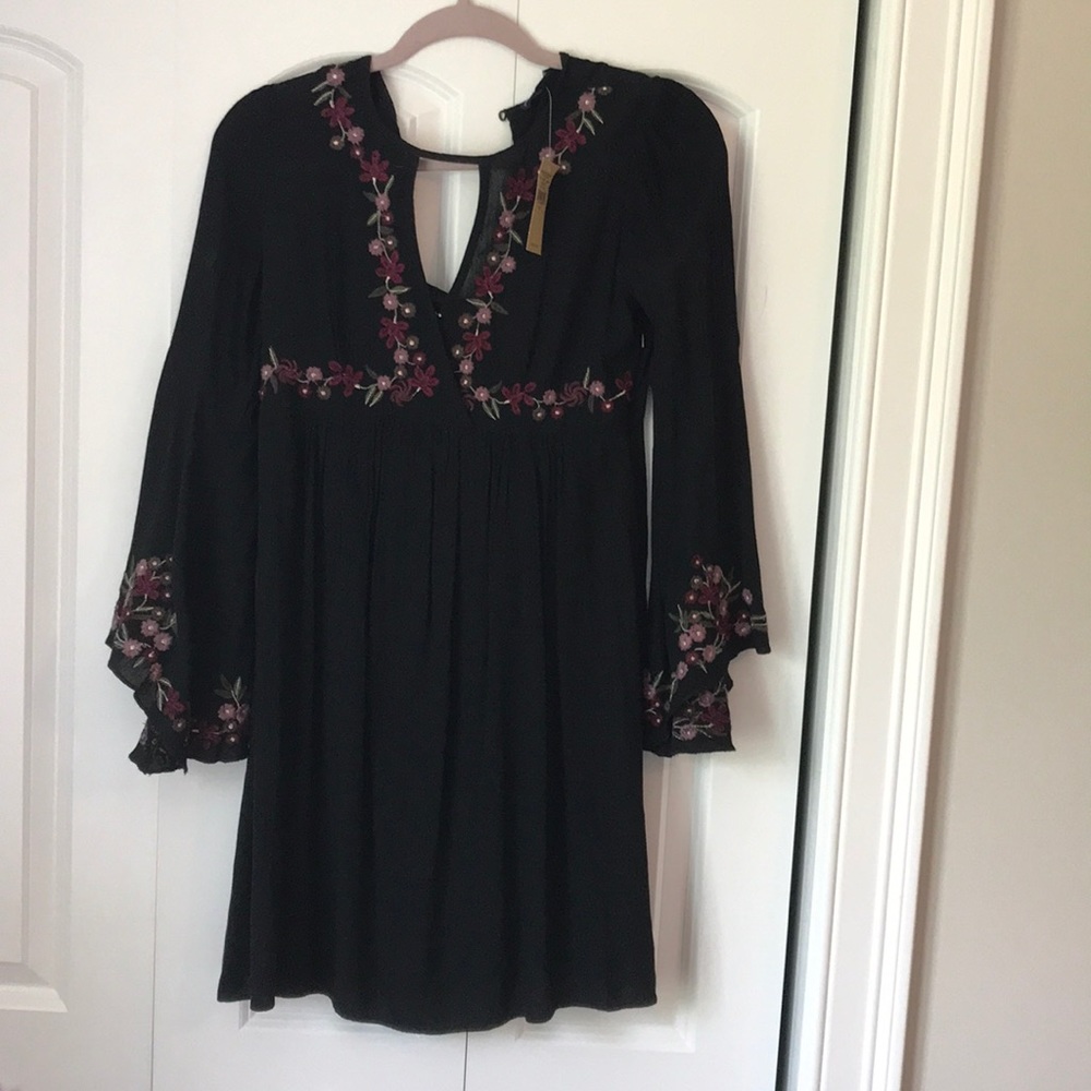 Black dress with light and dark purple flowers
